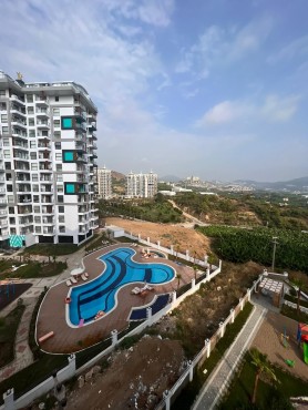 Alanya Mahmutlar'da  Havuz ve Doğa   Manzaralı Satılık 1+1 Daire